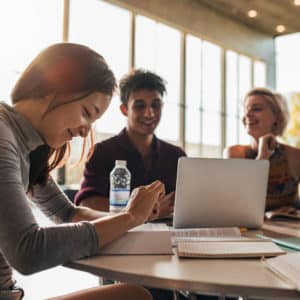 University students studying together in class