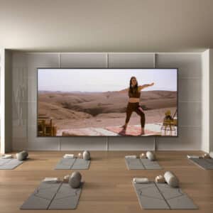 Digital screen video wall being used for yoga