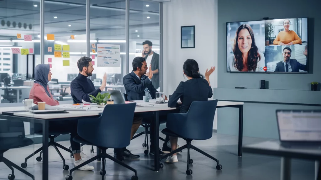 A meeting room setup showing a group video conferencing with a sound solution. 