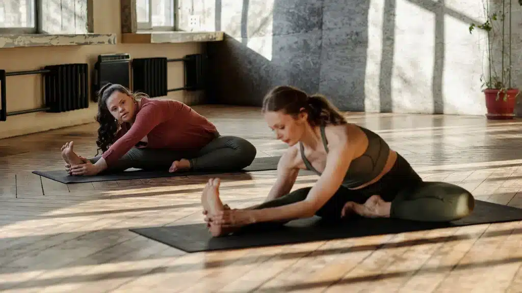 Shows an inclusive fitness class, showing accessibility at the gym.